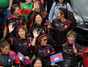 Ladies footballers from Asia taking part in the FRS GAA World Games opening parade on Monday evening.  Photo: George Sweeney. DER2330GS -