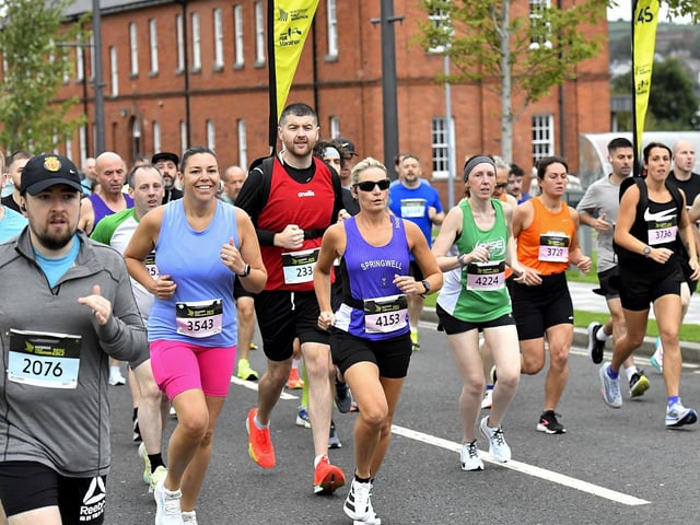 First Wave runners in the Waterside Half Marathon make their way out of Ebrington Square towards Limavady Road. Photo: George Sweeney