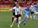 Institute’s Jamie McCormick breaks away from Dergview's Stephen Doherty, during Saturday's encounter at the Ryan McBride Brandywell Stadium. DER2309GS – 99