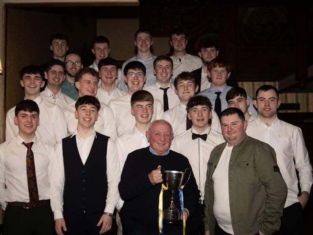 Coach Manus O'Donnell pictured with the under-21 Burt GAA Hurling squad at Saturday night's awards. (Photos: Jim McCafferty Photography)