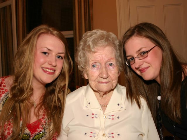 A Happy Mary with her Grand- daughters Emma and Nuala ODoherty.3892/dd : Parties and celebrations across Derry in May 2006.