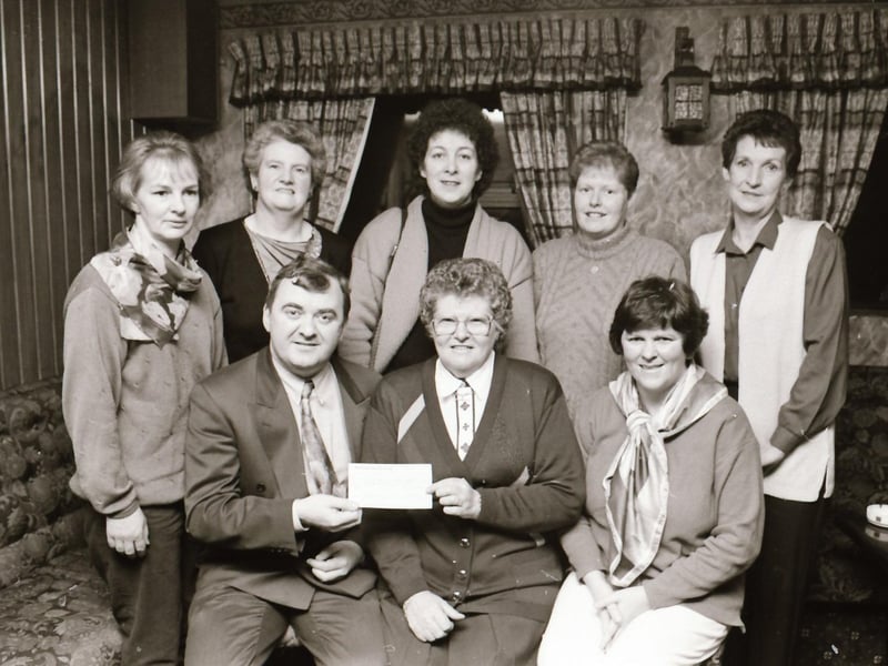 Presentation of a cheque for a cat scan in Inishowen.
