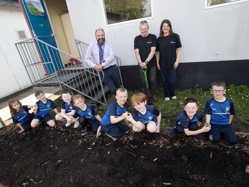 Pupils from Hollybush Primary School pictured celebrating 'International Compose Awareness Week' at the school on Tuesday of this week. Included are Mr. Feargal Friel, Princial and Kyle Suckling and Sharon McMaster, Natural World Products. (Photos: Jim McCafferty Photography)