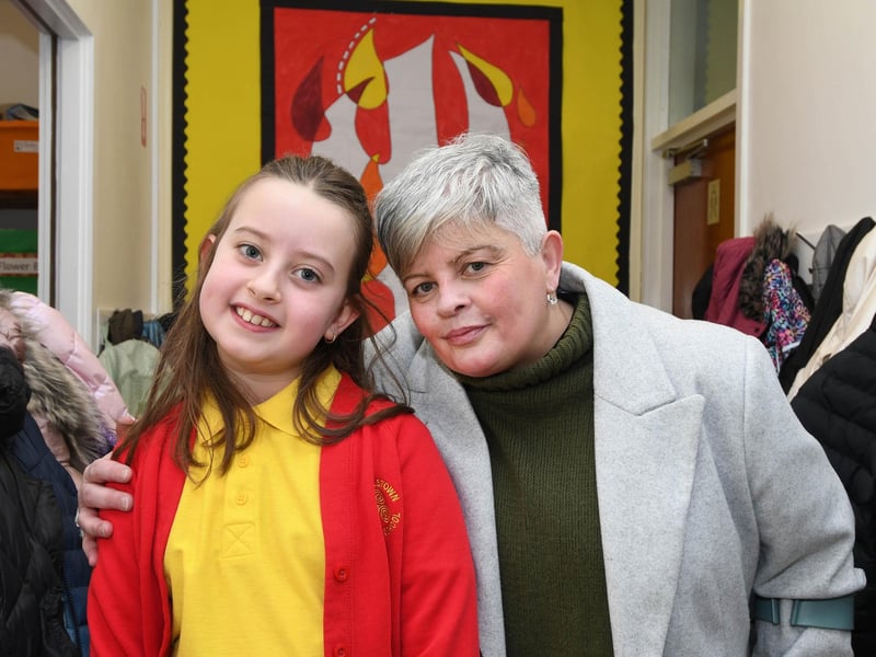 Primary 5 pupil Alex Kelly pictured with her grandfriend at the Steelstown PS 'Grandparents To School Day'.