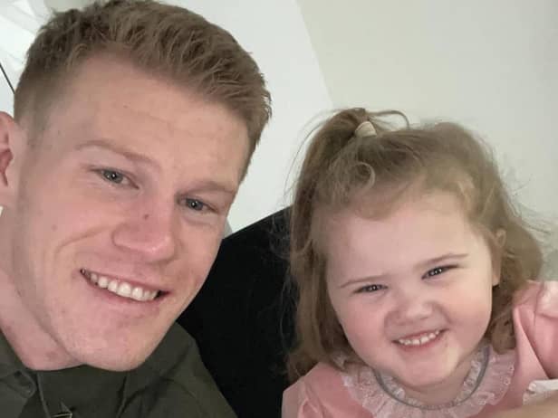 ALL SMILES . . . Wigan Athletic winger James McClean and his daughter Willow