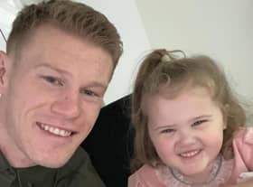 ALL SMILES . . . Wigan Athletic winger James McClean and his daughter Willow
