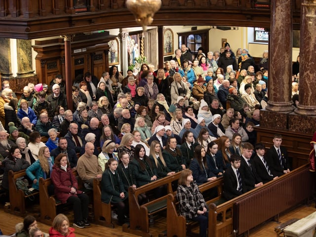 A section of the congratation in St. Columb'a Church, Long Tower on Saturday.