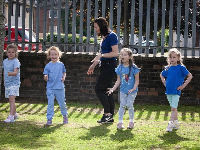 Encouragement for some of the girls before the start of one of the sprints races on Wednesday last at Greenhaw PS Sports Day.