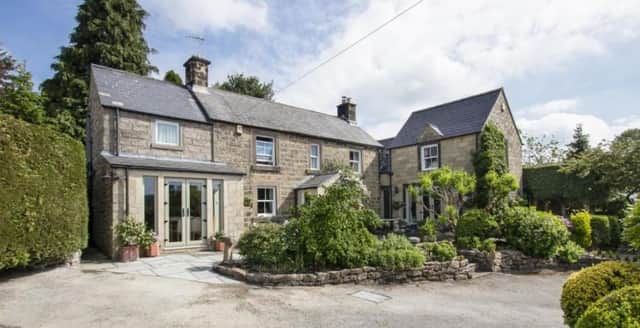 Yew Tree Cottage at The Knoll, Tansley, is on sale for £700,000.