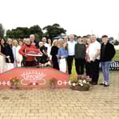 The Patsy Loughrey Memorial S1/S2 325 won by 'It's My Mystery'. Sadly Patsy recently passed away, but was a very enthusiastic greyhound supporters who frequented Lifford and Brandywell. Patsy’s family, including all his sons, daughters and their children and some of his brothers and sisters were present to share in the love of greyhounds that were always present in the Loughrey Household in Derry.  Winning owner Ciaran Coyle as well as trainer Charles Coyle, his son Shane, are pictured in the centre with the winner. (Photo by John Killen).