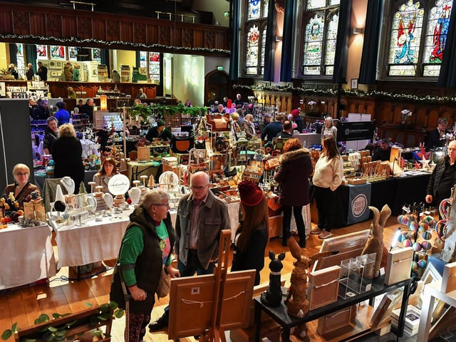 People browse the large range of gifts at the Guildhall Christmas Fair on Friday afternoon. Photo: George Sweeney / Derry Journal