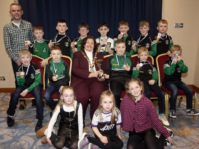 The Mayor of Derry City and Strabane District Council, Patricia Logue, pictured at the D&D Youth FA Annual Awards at the City Hotel on Friday night presents Dungiven Colts U10s with the Summer Plate. Included is coach Niall McGurk. (Photos: Jim McCafferty Photography)