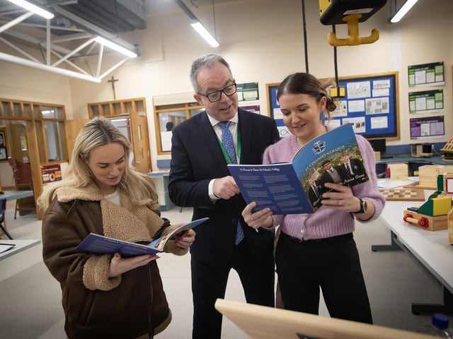St. Columb's College senior teacher Mr. McGonigle in conversation with mums during Saturday's Open Day. : .