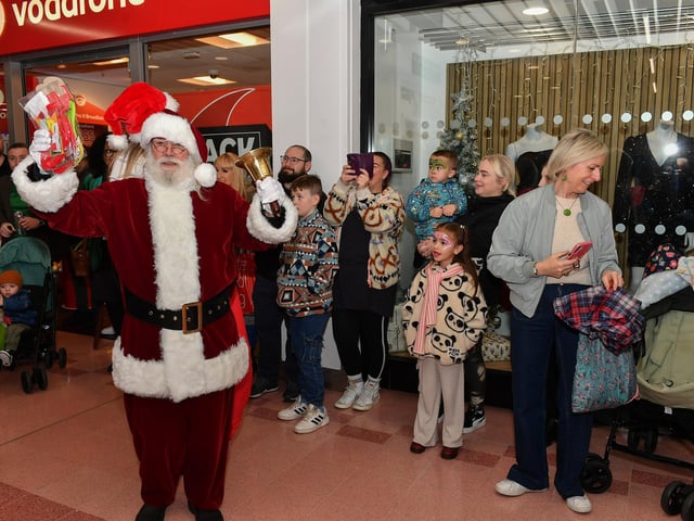 Santa arrives at the Richmond Shopping Centre on Saturday morning. Photo: George Sweeney