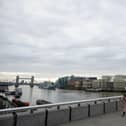 A woman crosses London Bridge during what would usually be the busy pre-9am rush-hour (Photo: Leon Neal/Getty Images)