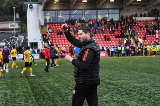 Derry City boss Ruaidhri Higgins salutes the home crowd after a big win over St Pat's in the FAI Cup second round at Brandywell. Photographs by George Sweeney.