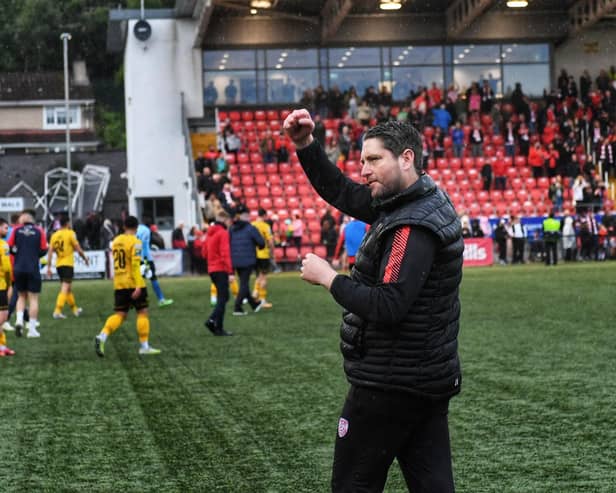 Derry City boss Ruaidhri Higgins salutes the home crowd after a big win over St Pat's in the FAI Cup second round at Brandywell. Photographs by George Sweeney.