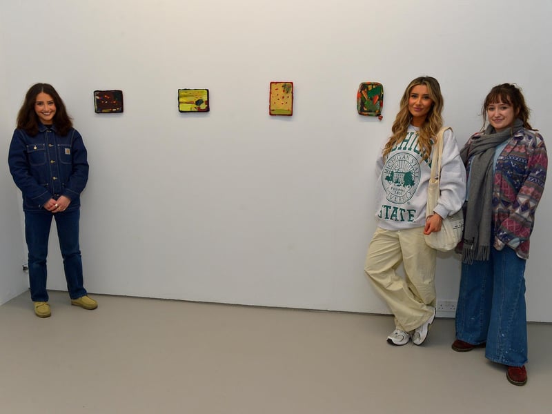 Derry born artist Yasmine Robinson, on the left, pictured with Amber Robinson and Emily McMillan alongside her exhibit ‘The Pits’ at the Centre for Contemporary Art’s ‘Urgencies’ Exhibition which runs until 18th March next. Photo: George Sweeney. DER2304GS – 27