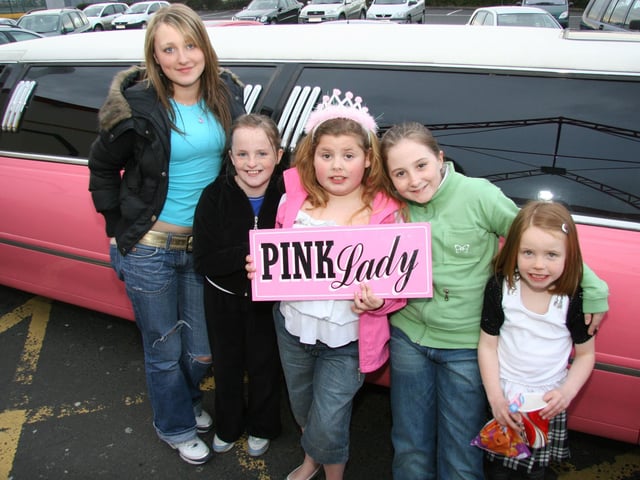 Hayley poses for a photographer with some of her party guests 0010JML : Parties and celebrations April 2006: Hayley Lynch.