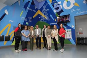 Anniversary Art… Pictured in front of a new mural in the foyer of Gallaigh Community Centre which was funded by the Housing Executive to mark 50 years of the estate are, (left to right) Tommy McCallion, manager, Amanda Clarke, Galliagh Community Centre, and Colr. Sandra Duffy, Eddie Doherty, Housing Executive West area manager, Andy Mullan, Housing Executive Good Relations Officer West, Martina Forrest, Housing Executive, Ciarrai Reilly, Housing Executive, and  Aileen Mellon, operations manager of On Street Community Youth. (Photo - Tom Heaney, nwpresspics)