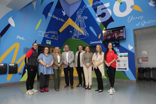 Anniversary Art… Pictured in front of a new mural in the foyer of Gallaigh Community Centre which was funded by the Housing Executive to mark 50 years of the estate are, (left to right) Tommy McCallion, manager, Amanda Clarke, Galliagh Community Centre, and Colr. Sandra Duffy, Eddie Doherty, Housing Executive West area manager, Andy Mullan, Housing Executive Good Relations Officer West, Martina Forrest, Housing Executive, Ciarrai Reilly, Housing Executive, and Aileen Mellon, operations manager of On Street Community Youth. (Photo - Tom Heaney, nwpresspics)