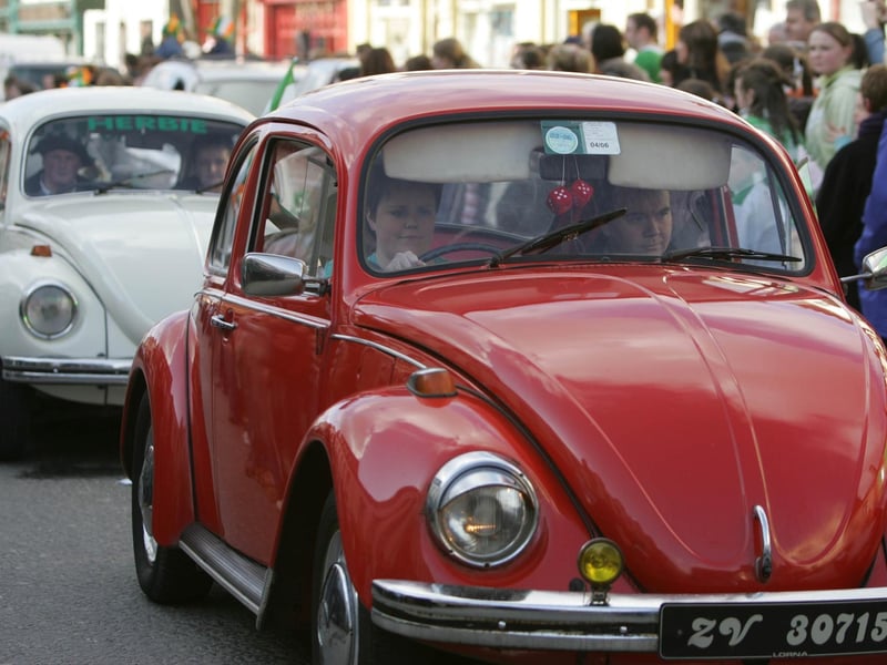 Beetles on parade. Two of the vintage VW Beetles who participated in the St. Patrick's Day parade in Buncrana. (1903JB25) : St Patrick's Day in Buncrana in 2006
