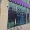 Windows were smashed and plywood erected in place of glass panelling.