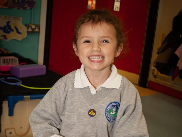Primary 1 pupil Sophie smiles for the camera at Sacred Heart PS this week.