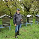 Abdul pictured at his hives in Carndonagh on a wet April day!