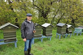 Abdul pictured at his hives in Carndonagh on a wet April day!