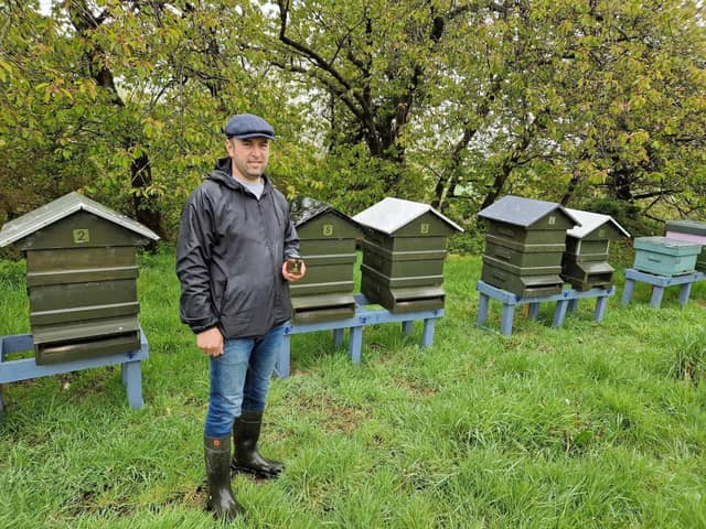 Abdul pictured at his hives in Carndonagh on a wet April day!