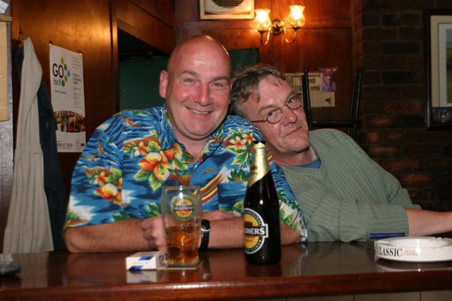 Enjoying a pint at the bar in Tinney's in June 2004.