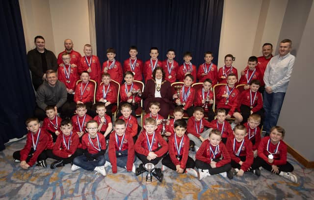 Mayor of Derry City and Strabane District Council, Patricia Logue, pictured with players and coaches from Newell Academy at Friday night's D&D Youth Awards. (Photo: Jim McCafferty Photography)