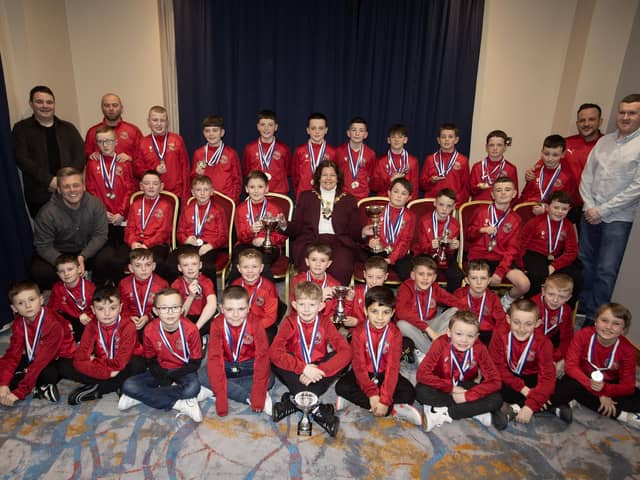 Mayor of Derry City and Strabane District Council, Patricia Logue, pictured with players and coaches from Newell Academy at Friday night's D&D Youth Awards. (Photo: Jim McCafferty Photography)