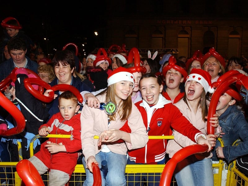 Enjoying the nights craic at the Christmas lights switch on. (1911C33) : Christmas Lights Switch on, from November 2004 in the Guildhall Square.