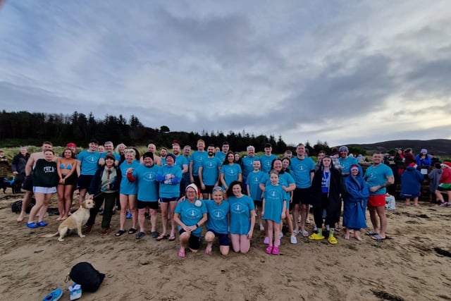 The Children's Eye Cancer fundraisers gather for the Christmas Day dip at Ludden.