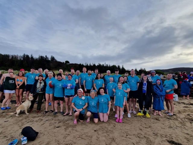 The Children's Eye Cancer fundraisers gather for the Christmas Day dip at Ludden.