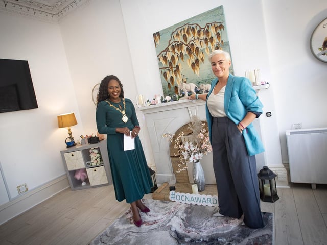 The Mayor, Lillian Seenoi-Barr gets a tour of one of the rooms with Leanne Doherty during Friday's opening. Jim McCafferty Photography.