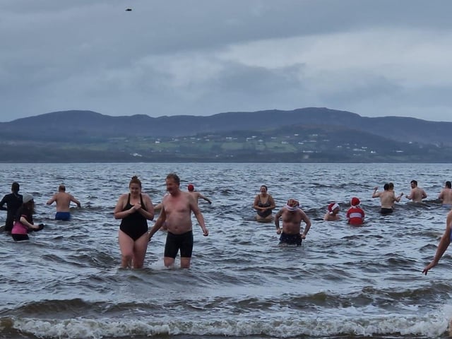 Christmas Day dippers at the annual swim at Ludden beach, Buncrana, County Donegal.