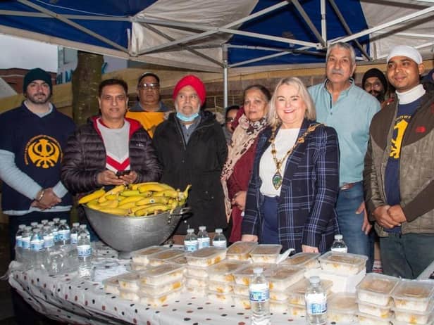 The Mayor, Sandra Duffy, with members of the Derry Sikh community as they celebrated the birth of Guru Nanak.