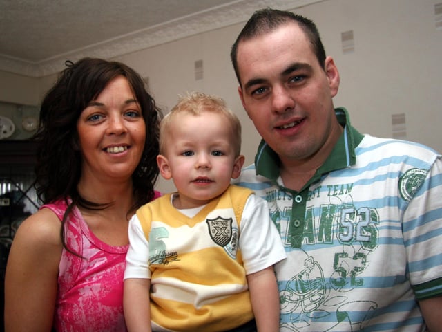 Joshua smiles for the camera with Godparents, Marie and Edward 0008JML : Parties and nights out in March 2006