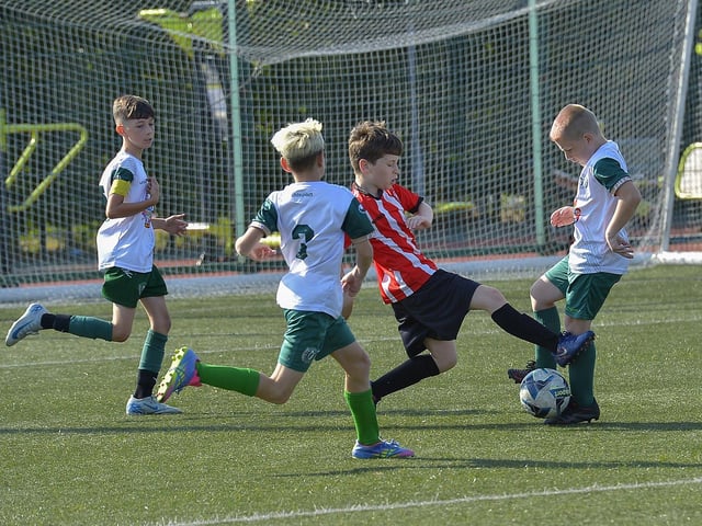 Tristar take on Foyle Harps at the Kian Dawson Kirk Memorial Cup competition held at Leafair. Photo: George Sweeney