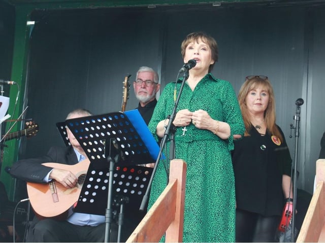 Dana sings at the open air Mass at Slane