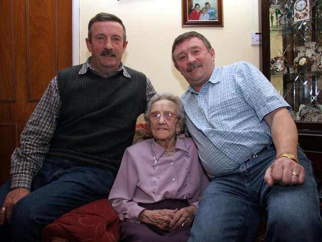 Birthday girl Elizabeth pictured with her sons, Sean and Gerry as she celebrates her 90th birthday 0040JML : Parties and celebrations April 2006: Elizabeth Doherty.