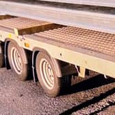 An image of the stolen trailer. The material loaded on it is not the material stolen last night.