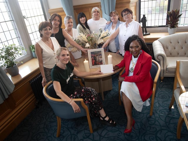 The family of the late Mari McGee pictured in the Guildhall with the Mayor, Lillian Seenoi-Barr during a reception in her honour on Tuesday evening. Marie passed away in May of this year. At front seated it Mari's daughter Ciarrai.
