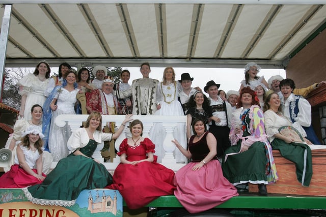 Buncrana pantomine cast all smiles for the camera. (1803C28) : St Patrick's Day Buncrana 2005.