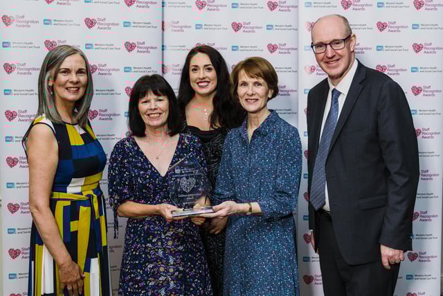 Lifetime Achievement winner Elizabeth (Betty) McFeeters, Nursing Assistant, Altnagelvin Hospital pictured with Karen Hargan, Director of Human Resources & Organisation Development; Michelle Doherty (nominator); Betty's daughter and Neil Guckian, Chief Executive, Western Trust.