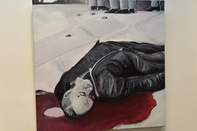 One of Square Bear’s paintings on display at the exhibition ‘Injustice’ in the Eden Arts Centre on Monday evening last. The exhibition commemorating the 51st anniversary of Bloody Sunday runs until 1st February next.  Photo: George Sweeney. DER2305GS – 78