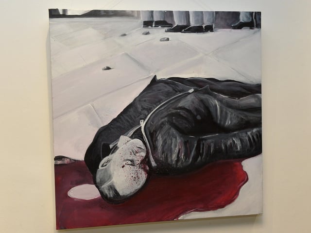 One of Square Bear’s paintings on display at the exhibition ‘Injustice’ in the Eden Arts Centre on Monday evening last. The exhibition commemorating the 51st anniversary of Bloody Sunday runs until 1st February next. Photo: George Sweeney. DER2305GS – 78